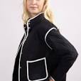 BLACK QUILTED JACKET WITH WHITE PIPING